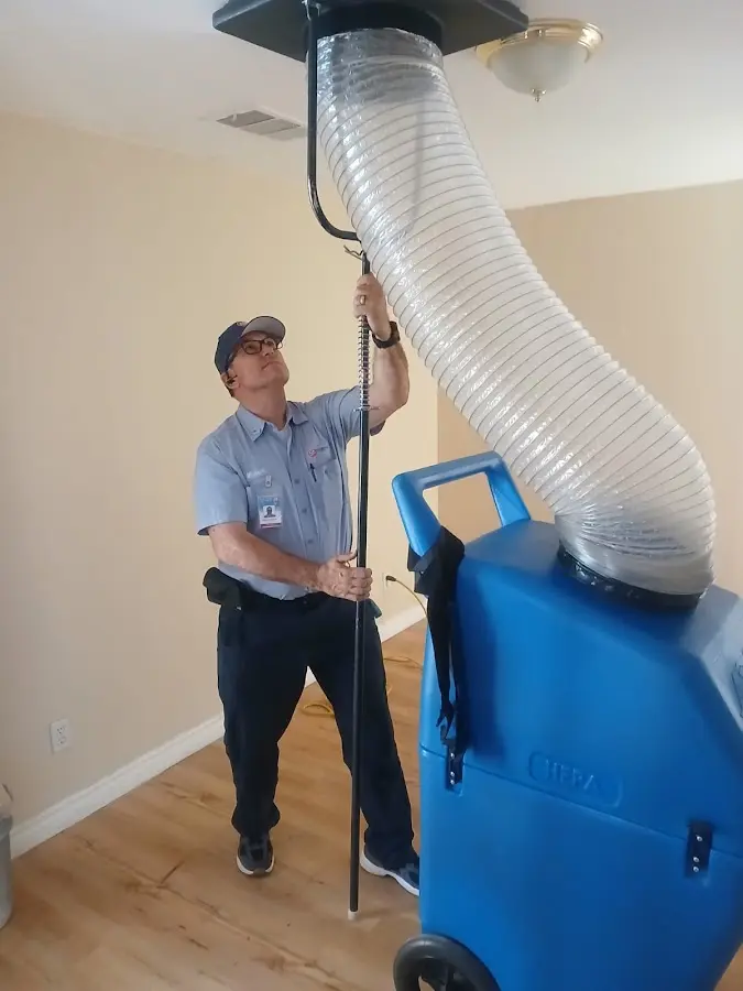 Mini Split Installation technician using HEPA equipment in Zimmerman